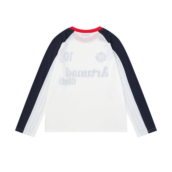 Front view of a white raglan long-sleeve tee with navy sleeves, red collar, and faint chest graphic
