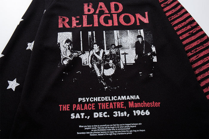 Close-up of black tee front with red Bad Religion lettering, monochrome concert graphic, stars, and red striped sleeve