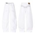 White baggy barrel-leg jeans with embroidered R patch pockets on front and wing graphic on back waistband