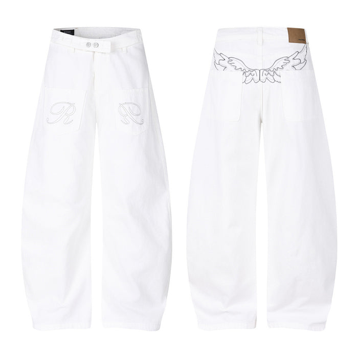 White baggy barrel-leg jeans with embroidered R patch pockets on front and wing graphic on back waistband