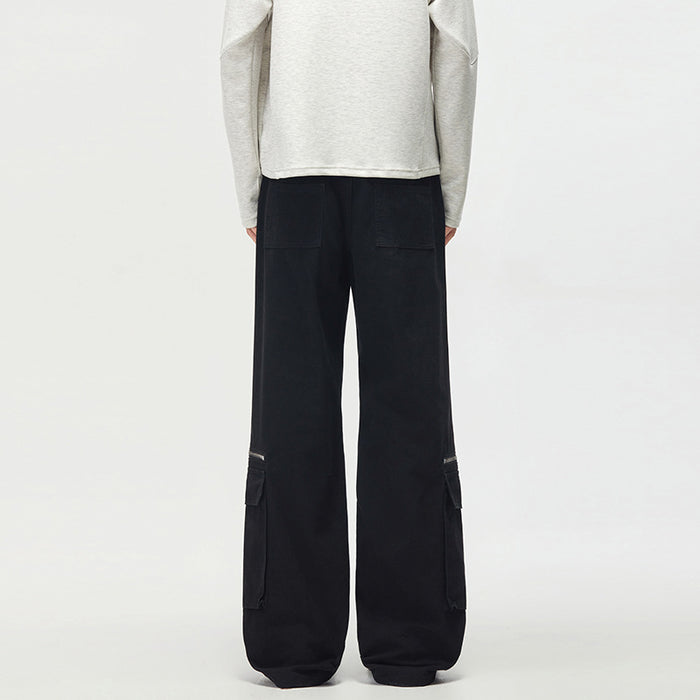 Back view of black wide-leg cargo pants with rear patch pockets and lower side cargo pockets