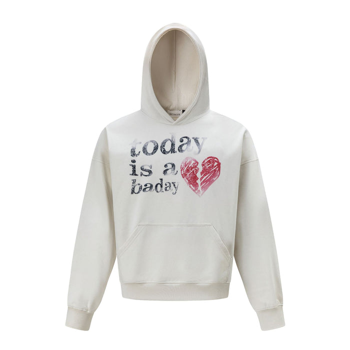 Oversized pullover hoodie with distressed 'today is a bad day' broken heart graphic print in cream colorway