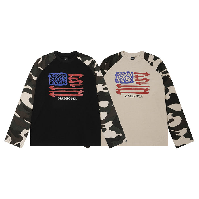 Two raglan long sleeve shirts, black and beige, with camouflage sleeves and colorful arrow graphics
