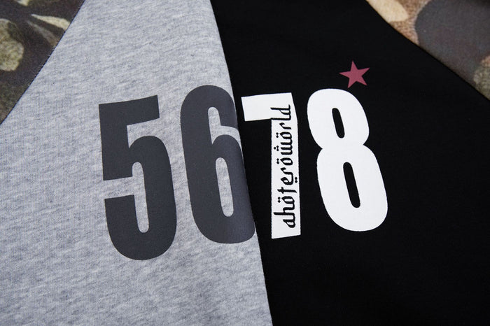 Close-up of the hoodie number graphic showing 5678 lettering with a red star accent