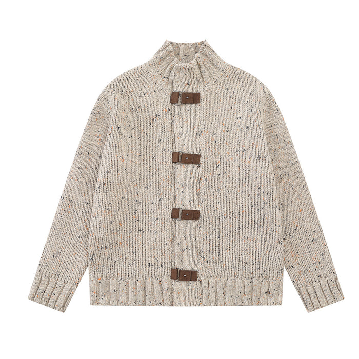 Chunky ribbed knit cardigan sweater with brown leather buckle closures and mock neck in oatmeal and black