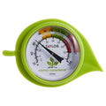 Close up of lime green compost thermometer with leaf guard dial visible and compost symbol
