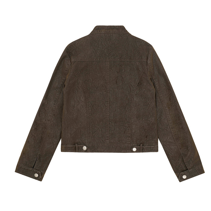 Back view of a distressed brown cropped moto jacket with panel seams, stand collar, and snap-tab cuffs