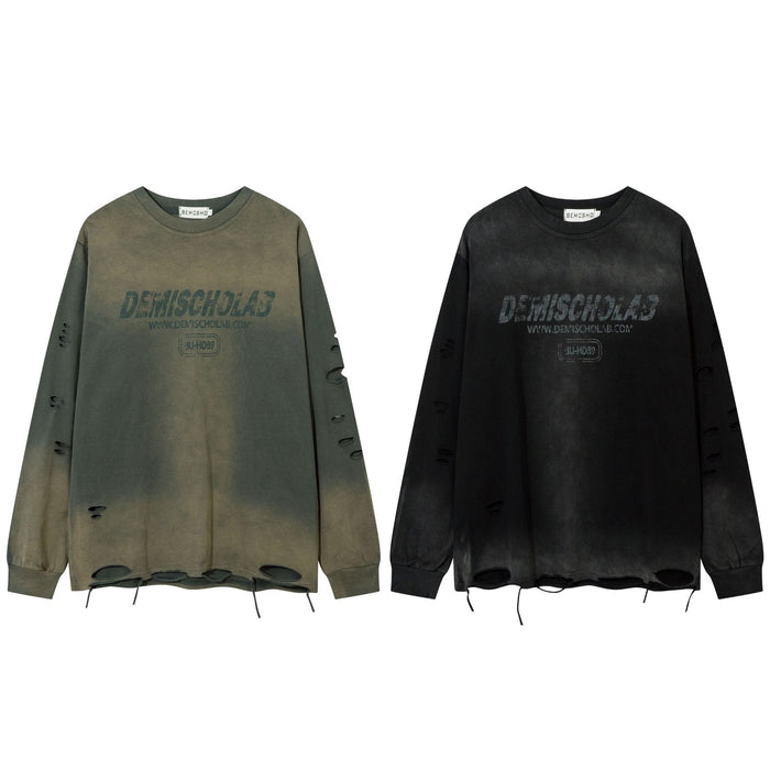 Front comparison of olive and black distressed long sleeve shirts with acid-washed coloring, chest graphics and ripped hems