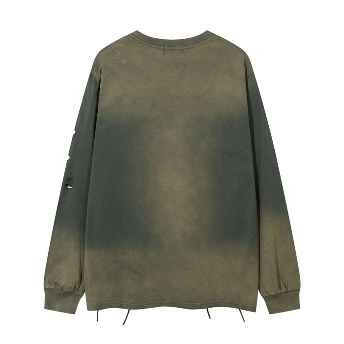 Back view of an olive acid-washed long sleeve shirt with distressed sleeve details and loose ripped hem threads