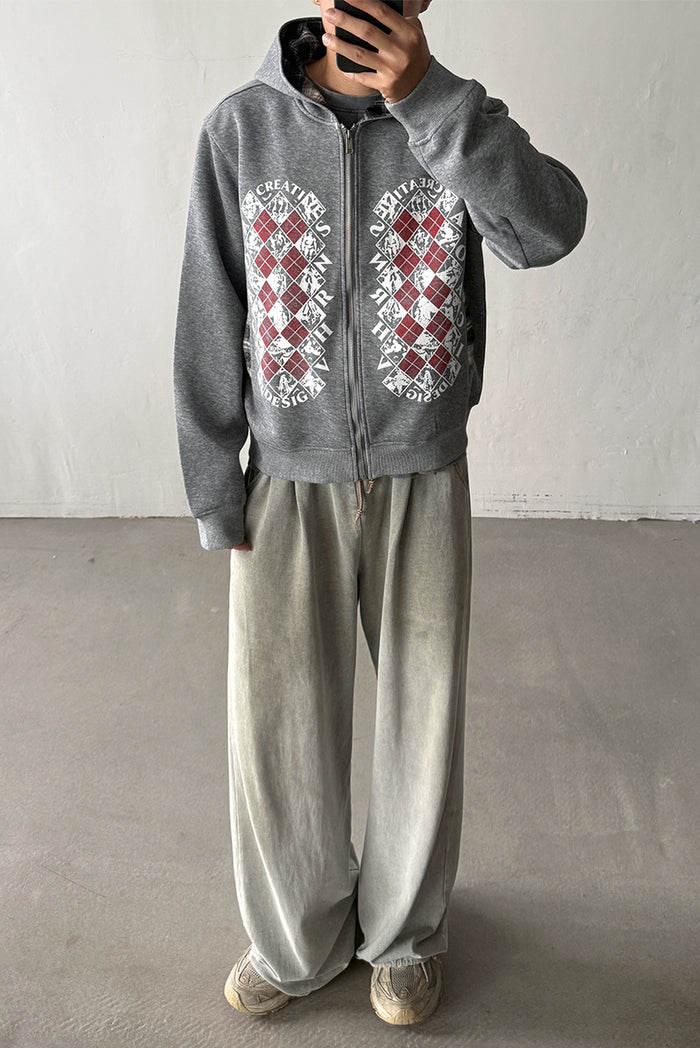 Model wearing a gray full-zip hoodie with red, white, and gray argyle front graphics