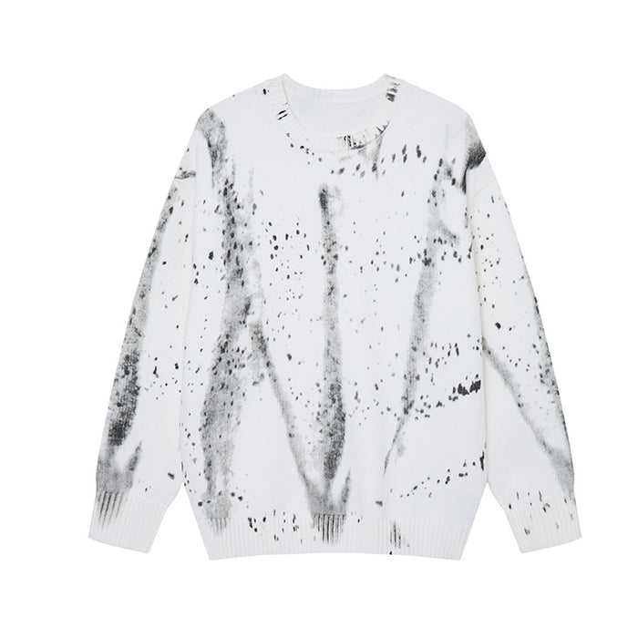 White crew neck knit sweater shown from the front with gray distressed streaks and black splatter marks