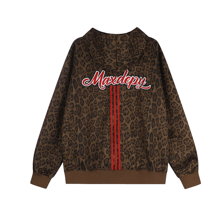 Back view of a brown leopard-print zip-up hoodie with white script lettering and red vertical stripes