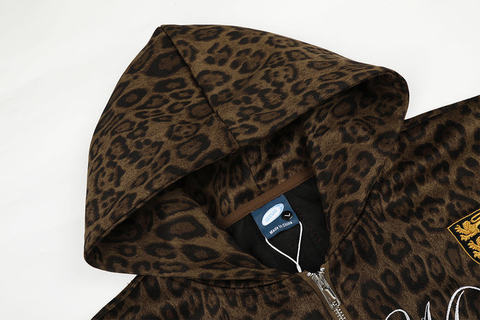 Close-up of the brown leopard-print hood, zipper and inner neck label