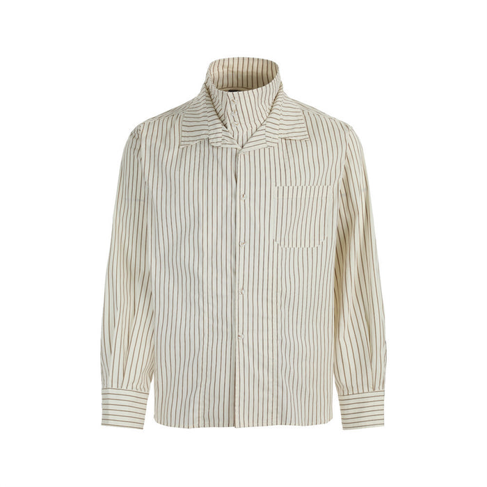 Front view of the cream dress shirt with brown vertical stripes, pointed collar, chest pocket, and long sleeves