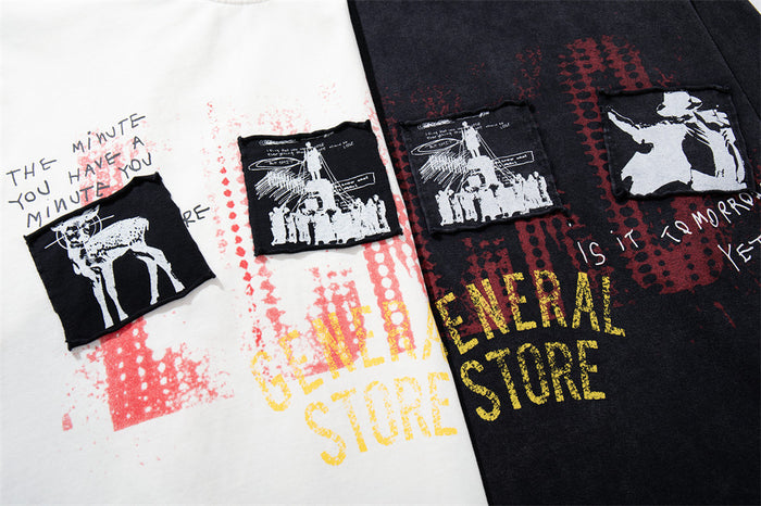 Close-up comparison of white and black shirt fronts featuring matching framed illustrations and General Store graphics