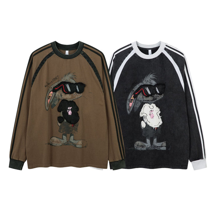 Brown and black long sleeve raglan shirts with striped sleeves and raised rabbit graphic patches