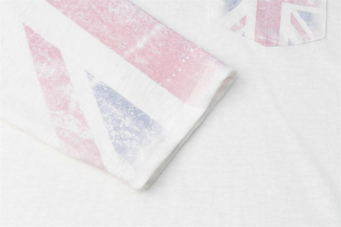 Close-up of the white sleeve cuff with faded pink and blue Union Jack print