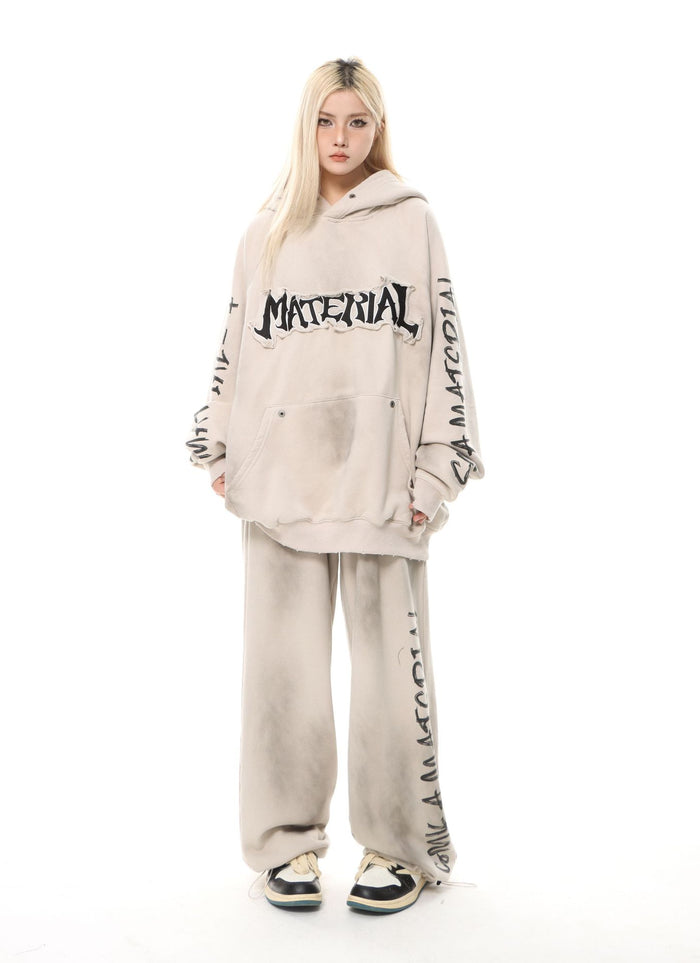 Oversized washed heavy fleece hoodie with gothic MATERIAL embroidered chest patch and sleeve text print in sand beige