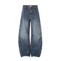 Front view of washed blue wide-leg barrel jeans with curved seams and faded thigh panels