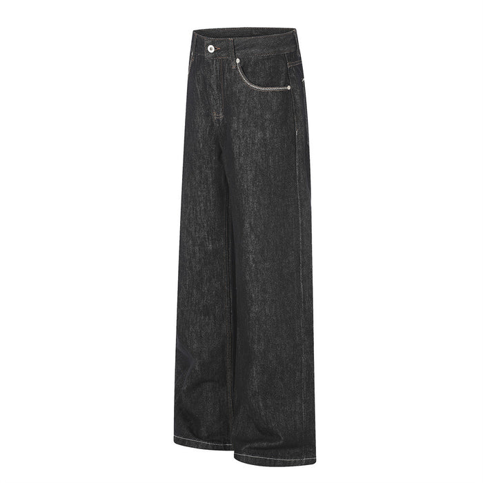 Angled side view of black wide-leg denim jeans showing the front pocket and full-length leg