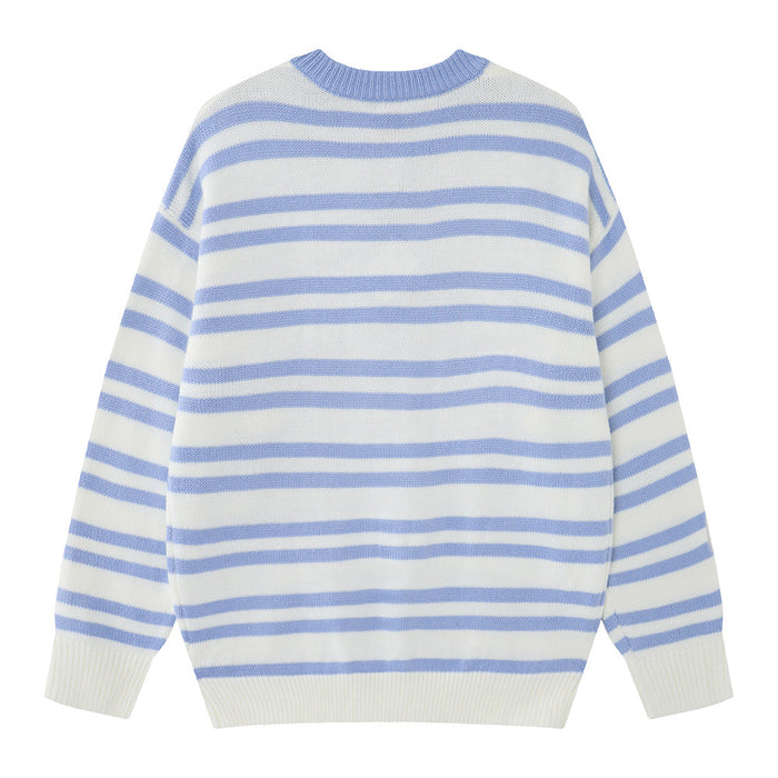 Back view of a blue and white striped knit sweater with a plain crew neckline and ribbed hem and cuffs