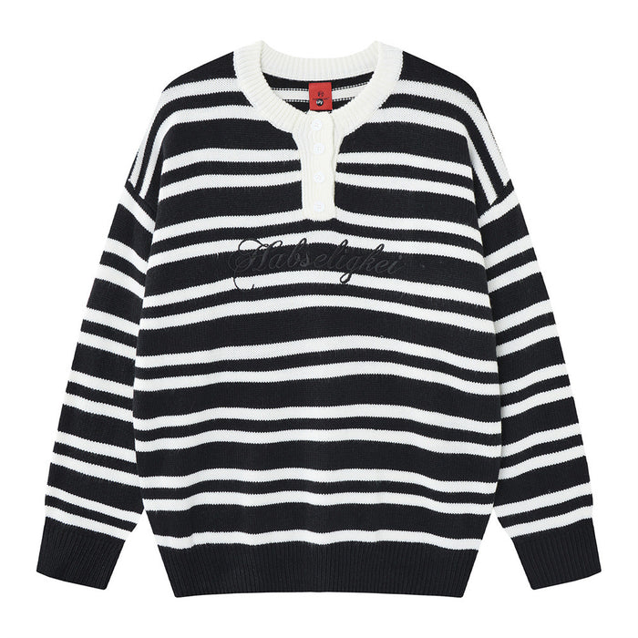 Front view of a black and white striped knit henley sweater with white button placket and dark script chest detail