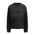 Black faded-wash long-sleeve shirt front with a small graphic mark on the chest
