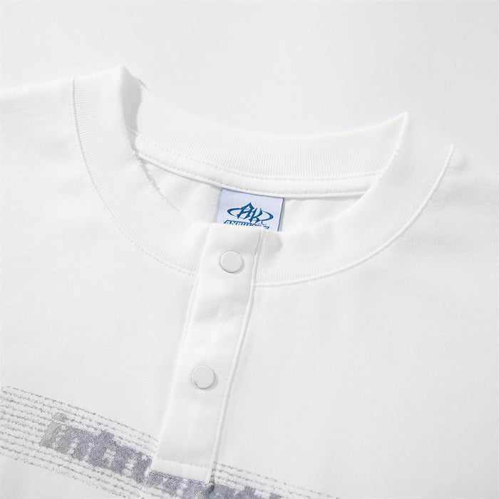 Close-up of the white Henley shirt collar and two-button placket with visible stitching