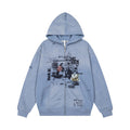 Washed light blue zip-up hoodie with hood, distressed details, and black collage graphic on the front