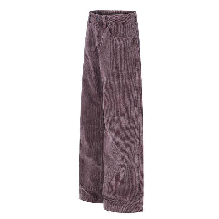 Angled side view of mauve wide-leg corduroy pants showing the relaxed silhouette and ribbed texture