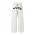 Men's wide-leg sweatpants with distressed vintage Nowtrend Studio graphic print in light grey marl and black colourways