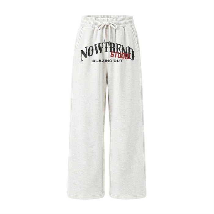Men's wide-leg sweatpants with distressed vintage Nowtrend Studio graphic print in light grey marl and black colourways