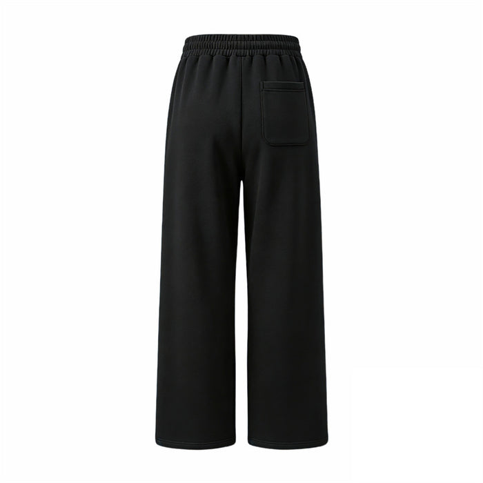 Back view of black wide-leg sweatpants showing the elastic waistband and rectangular rear pocket