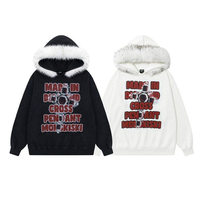 Black and white oversized hoodies with faux-fur trim and distressed red cross graphic on the front
