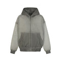 Front view of a washed gray oversized zip-up hoodie with hood, kangaroo pockets, and contrast ribbed cuffs
