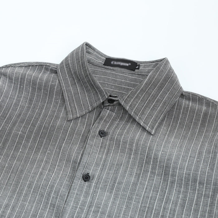 Close-up of the gray pinstripe shirt collar, upper button placket, and dark buttons