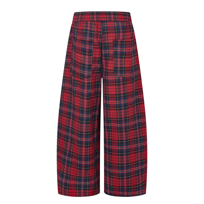 Back view of red plaid wide-leg trousers with a gathered elastic waistband and full-length legs