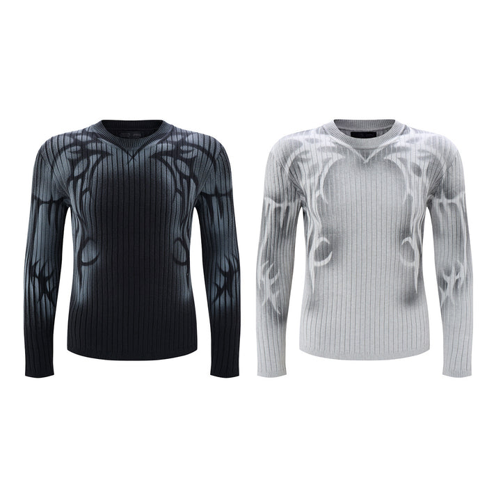 Two ribbed crew neck sweaters shown front-facing in black and light gray with abstract tribal graffiti prints