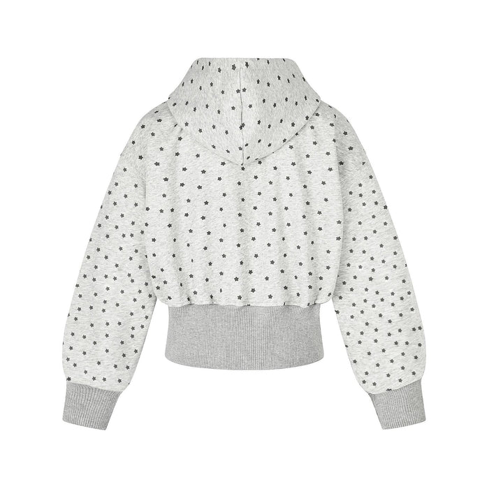 Back view of a gray cropped zip-up hoodie covered in small black stars with ribbed hem and cuffs