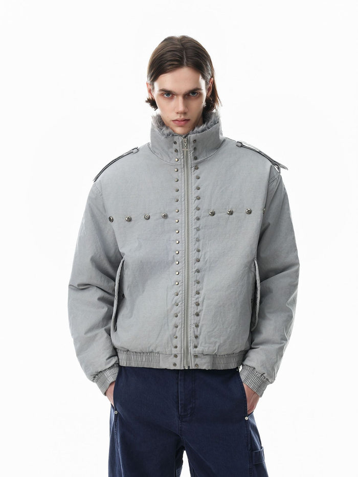 Studded faux fur collar padded bomber jacket in grey and black with silver hardware and ribbed hem
