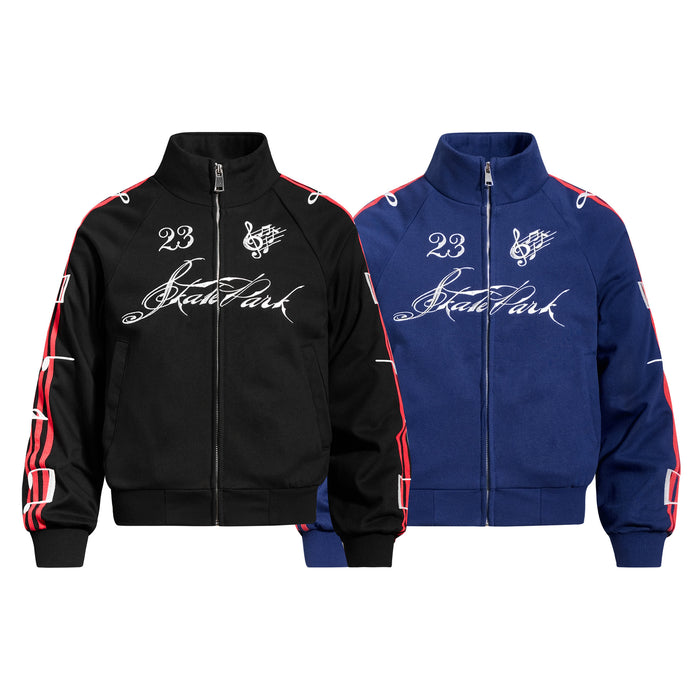 Black and navy stand-collar track jackets with full zippers, script lettering, music notes, and striped sleeves
