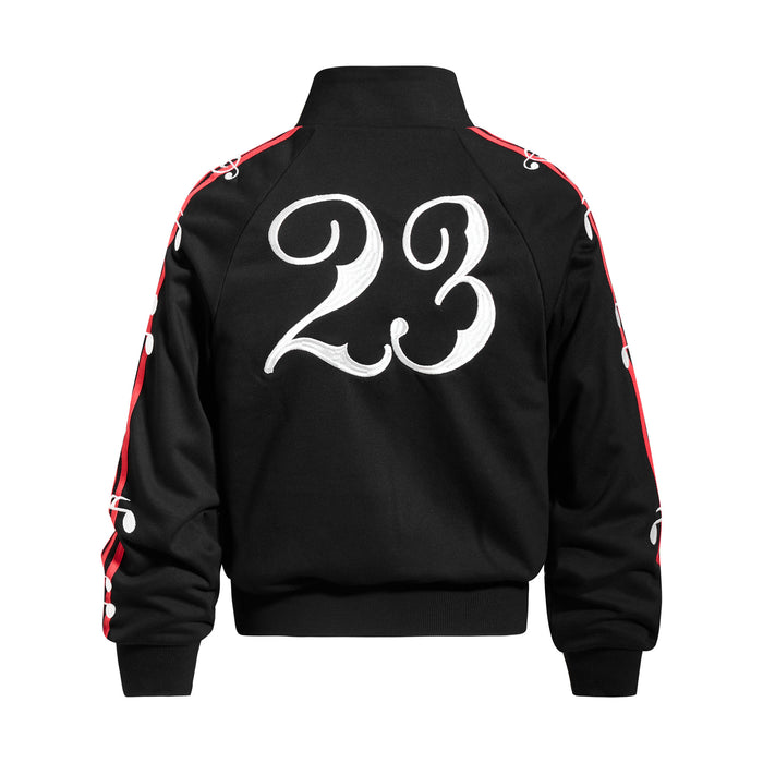 Back view of a black track jacket featuring a large white number 23 graphic and striped sleeves