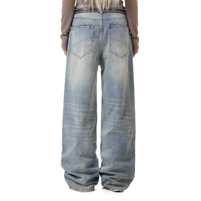 Light blue wide-leg jeans worn from the back, showing two stitched rear pockets and faded denim