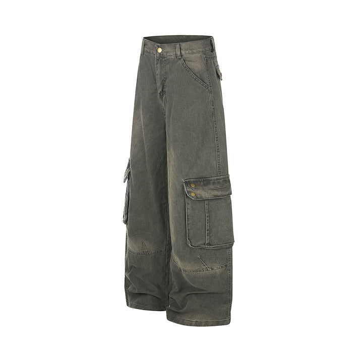 Side view of olive wide-leg cargo jeans showing the layered flap cargo pocket and stitched denim panels