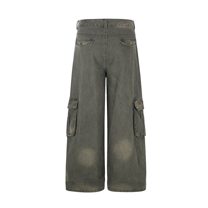 Olive washed cargo jeans shown from the back with two flap pockets and cargo pockets on both legs