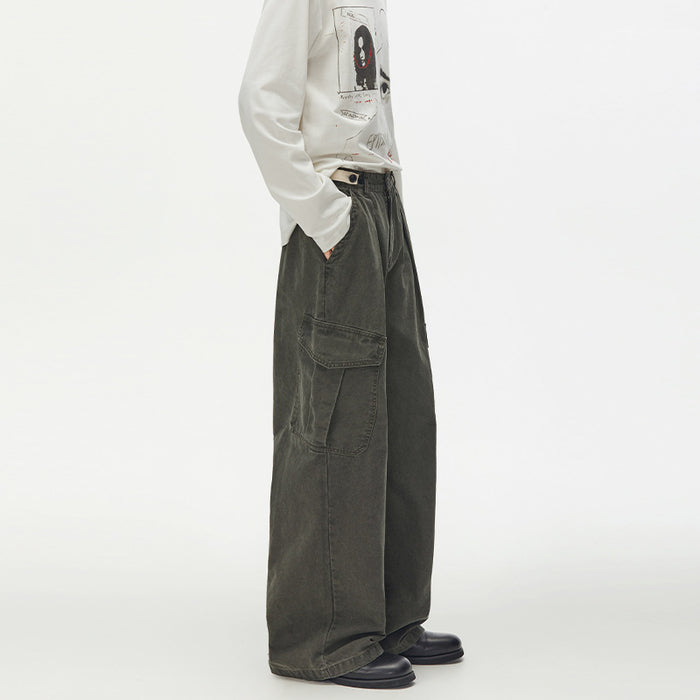 Side profile of army green wide-leg cargo pants showing the waistband, large flap pocket, and full trouser leg