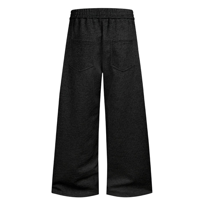 Black wide-leg sweatpants back view with elastic waistband and two stitched back pockets