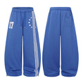 Blue wide-leg sweatpants shown side by side from front and back, featuring striped star-print front and rear pocket