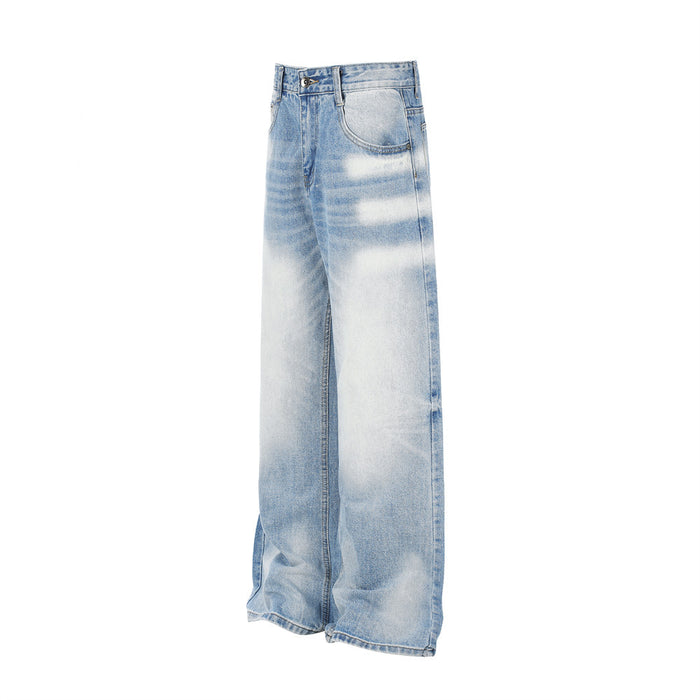 Angled side view of wide-leg light blue jeans showing the relaxed straight-leg cut and washed fading