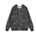 Dark grey all-over zebra stripe print zip-up hoodie jacket with silver pyramid rivet studs along the shoulder seam, front and